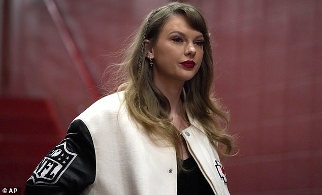 Swift had part of her hair braided as she made her way up to a Chiefs suite prior to kickoff