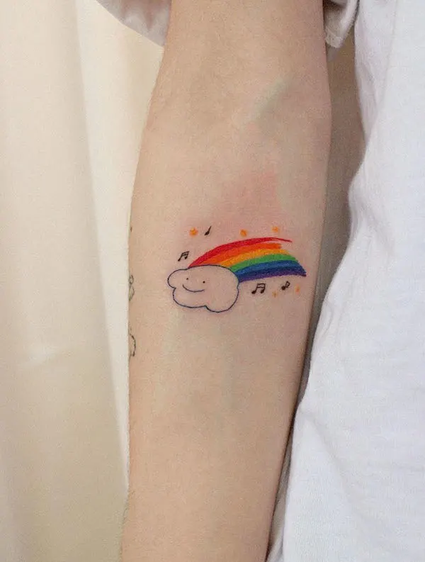 Cute rainbow over the cloud tattoo by @inggo.tattoo