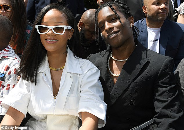 Long history: Rihanna and A$AP Rocky have been friends for years, and he even opened for her on her Diamonds World Tour in 2013; they are pictured at Paris Fashion Week in 2018