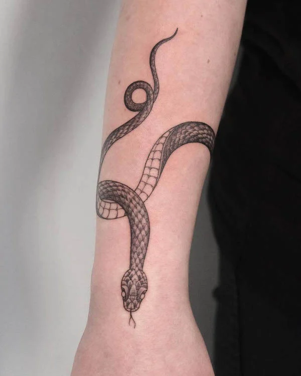 Snake armband tattoo by @crst_tattoo