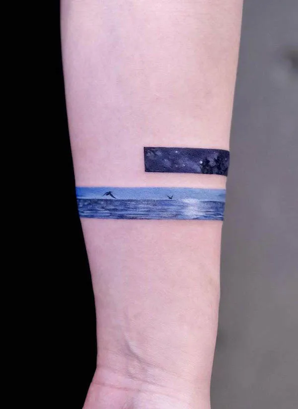 Ocean and night sky tattoo by @newtattoo_demi