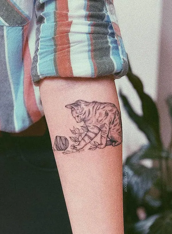 Cute cat tattoo by @alvina.tattooe