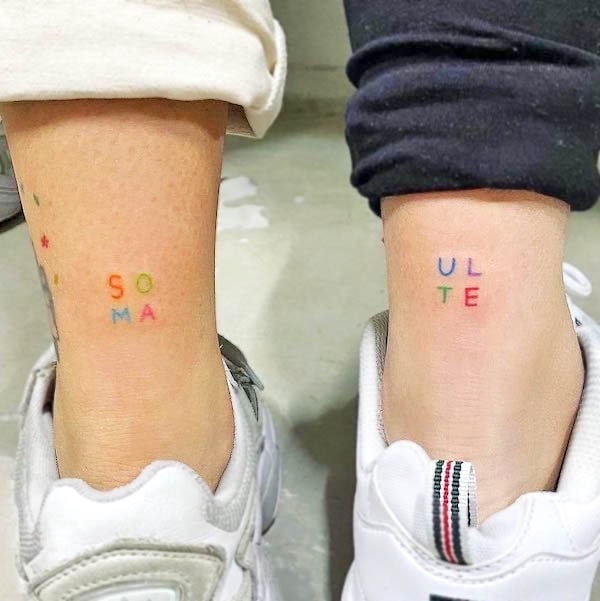 Matching soulmate lettering tattoo by @txttoo