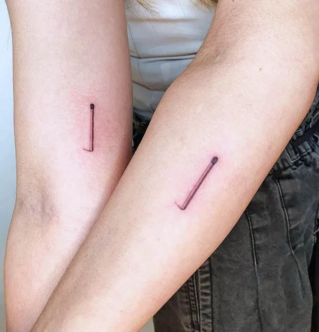 A couple of match tattoo to ignite the fire within by @loko_lines- Minimalist matching BFF tattoos