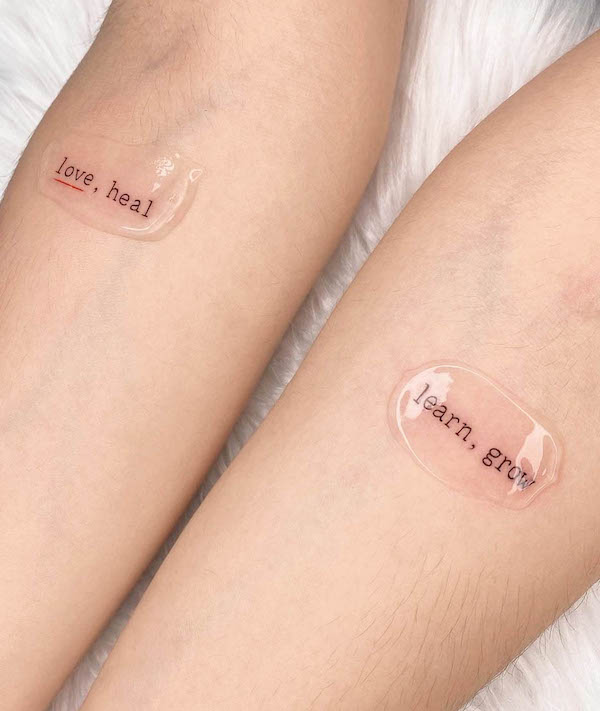 Meaningful matching word tattoos by @blue_glue_tattoo