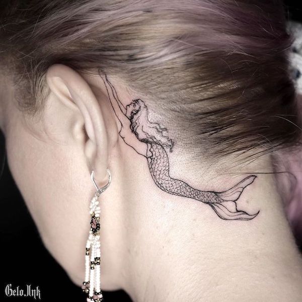 Mermaid tattoo behind the ear by @gelo.ink_