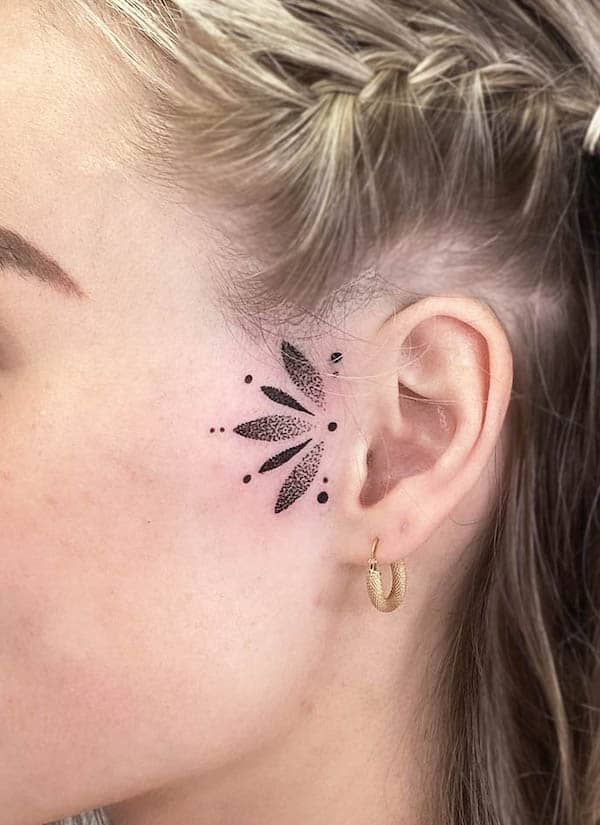 Ornamental ear tattoo by @lauren.ansbro.tattoos