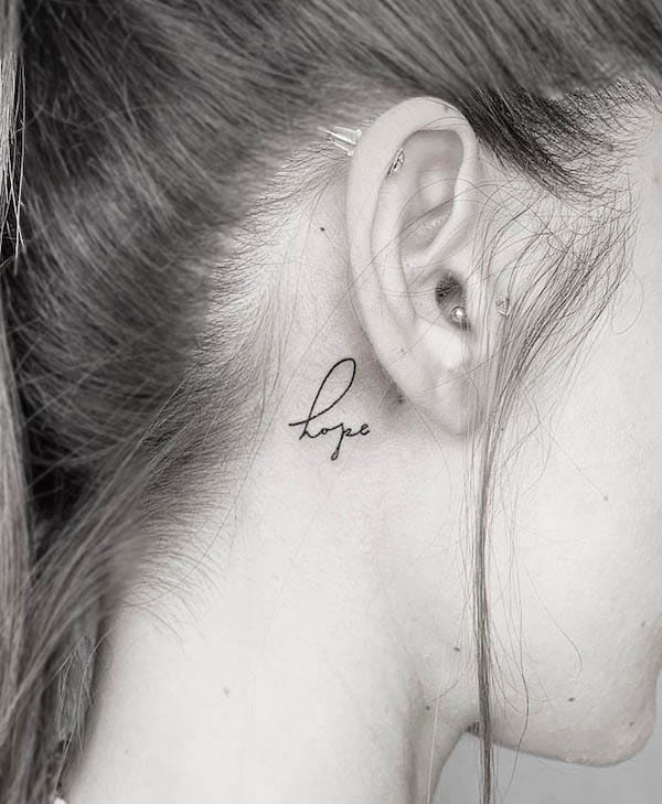 Hope_one-word behind-the-ear tattoo by @guncealtun