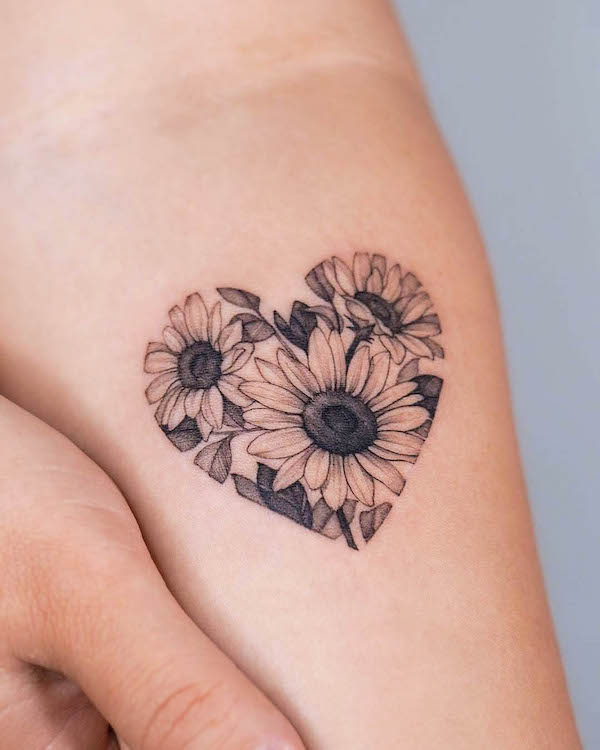 Sunflowers in a heart shape by @zeetattoo