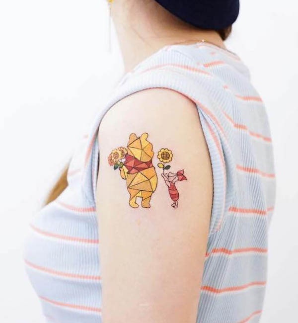 Geometric Winnie the Pooh and sunflower tattoo by @zada_hk