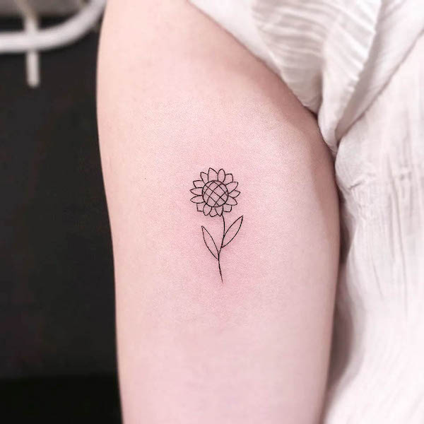 Simple tiny sunflower tattoo by @gorae_tattoo