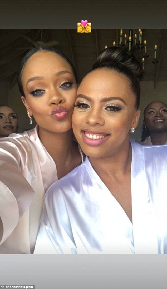 Queen: In one image, Rihanna and Sonita posed for a selfie wearing silky robes ahead of the big day where her friend married Raymond Walker