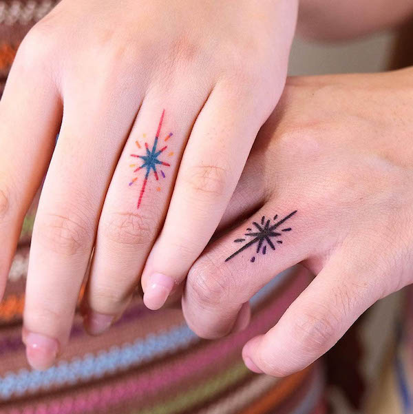 Matching star symbol tattoos for couple by @cocoa._.jam_