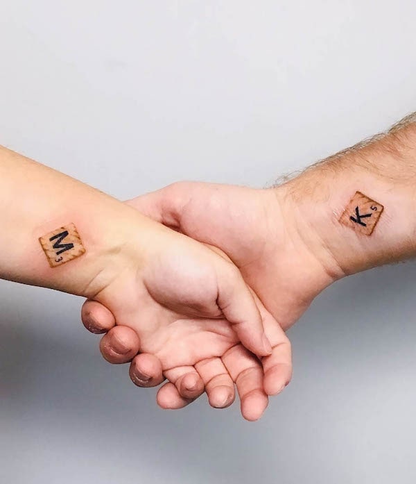 Unique initial tattoos for couple by @atticustattoo