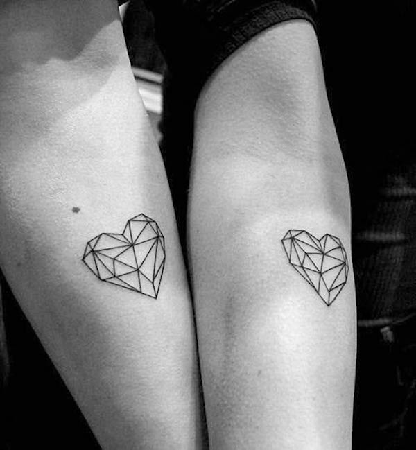 Diamond heart tattoos for couple by @inkedupcouples