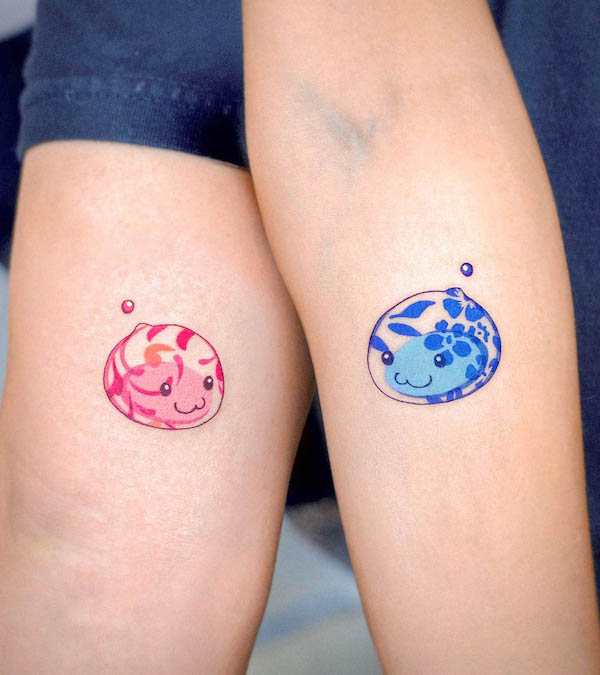 Cute matching tattoos for couple by @e.nal_.tattoo