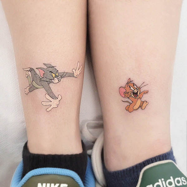 Tom and Jerry tattoos by @vogli.tattoo