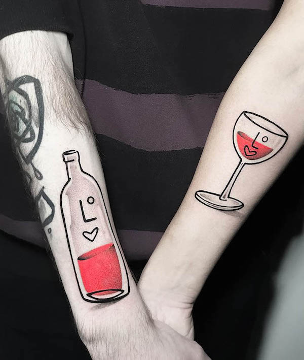 Wine and wine glass tattoos for couple by @conio_polifamous