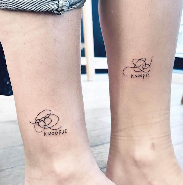 Tangled lines tattoos for couple by @doetanitattoer