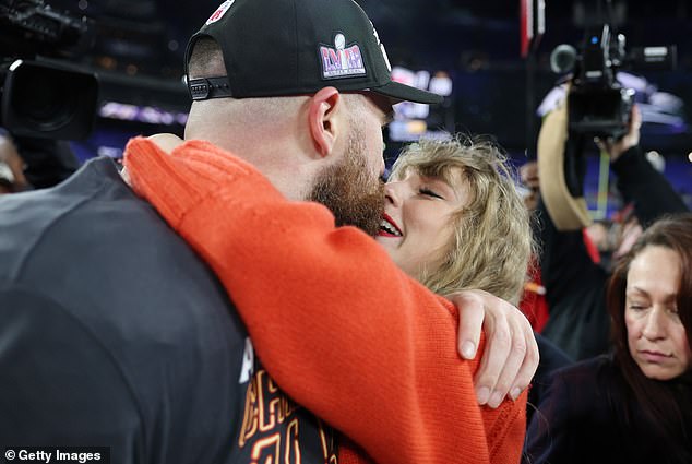 The couple also shared a passionate kiss after the Chiefs' win against the Baltimore Ravens