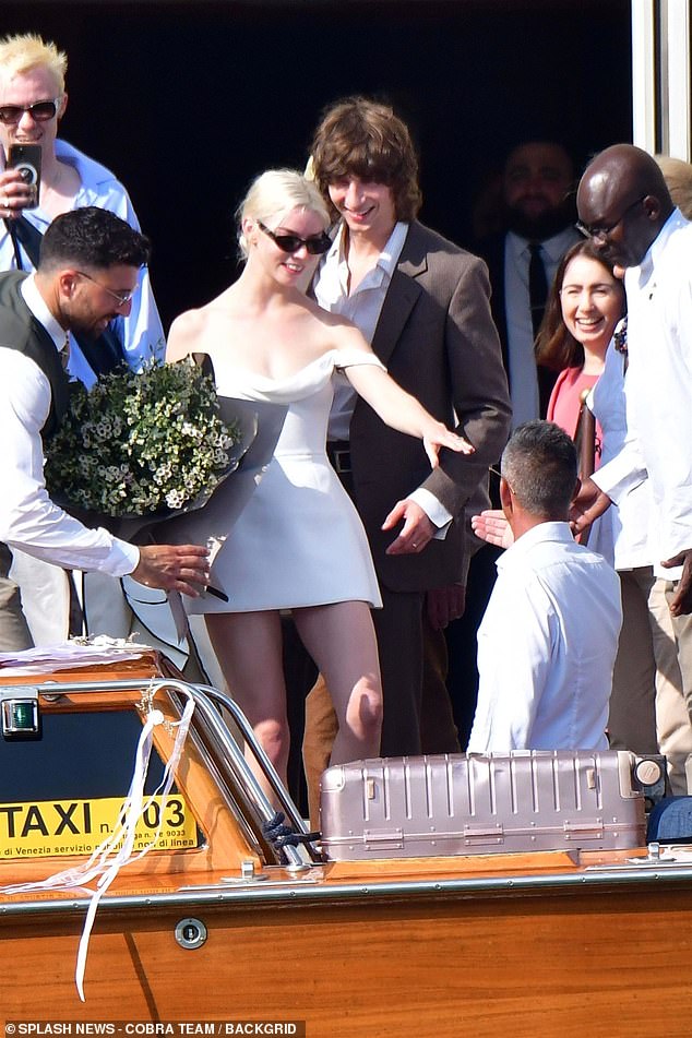 EXCLUSIVE: Anya Taylor-Joy gets steamy with husband Malcolm McRae on a  Venetian water taxi while sporting corseted white mini for day two of their  stunning Italian wedding | Daily Mail Online