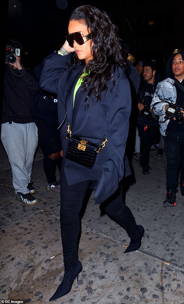 Back in town: Rihanna had only just arrived back in the United States on Sunday - she was spotted in the daytime strolling through John F. Kennedy International Airport