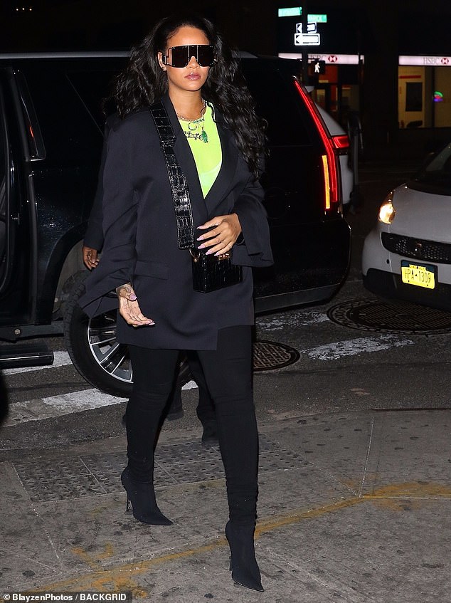 Fabulous: Rihanna was as striking as ever when she was spotted outside the Sound Of Brazil nightclub in Manhattan this Monday