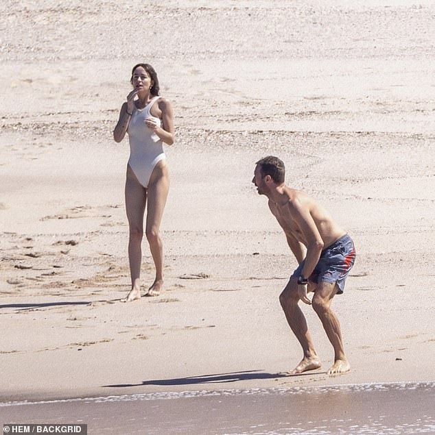 Later, the duo were seen drying off next to an oceanfront cabana with their respective beach towels