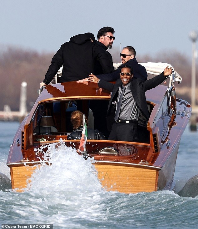 A$AP Rocky couldn't contain his excitement as he threw his hands up and smiled