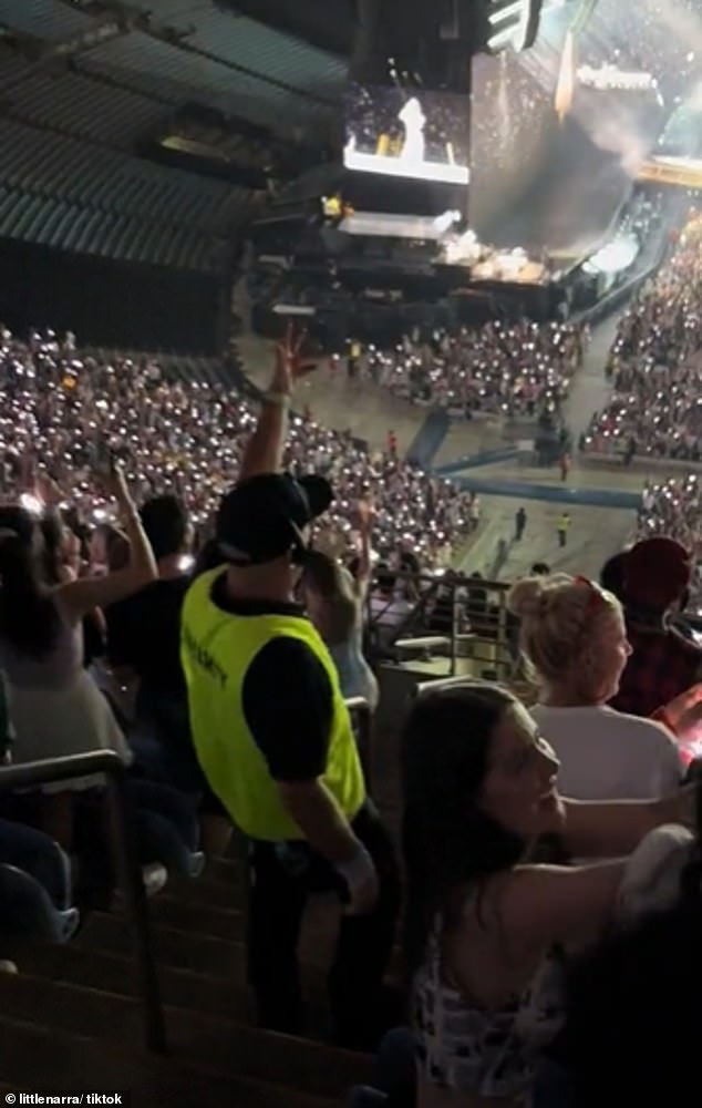 Footage has gone viral of a security guard dancing wildly while working at one of Taylor Swift 's concerts in Sydney