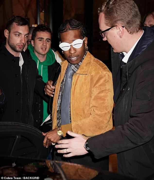 A$AP Rocky commanded attention in a pair of quirky white glasses as he stepped out during Milan Fashion Week on Sunday