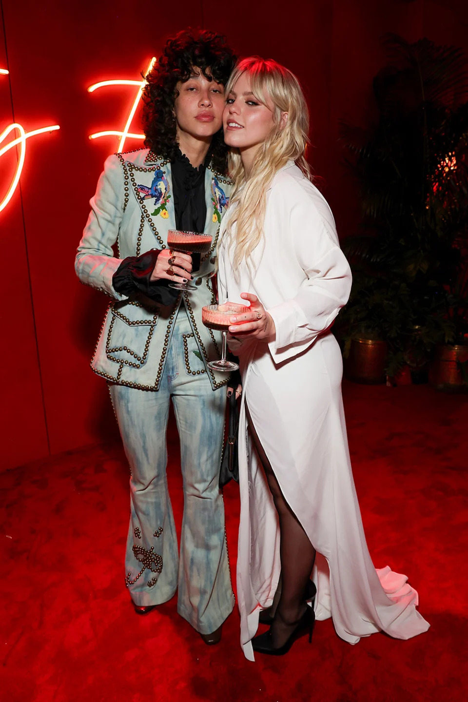 Towa Bird and Reneé Rapp attend the 2024 Vanity Fair Oscar Party Hosted By Radhika Jones at Wallis Annenberg Center for the Performing Arts on March 10, 2024 in Beverly Hills, California.