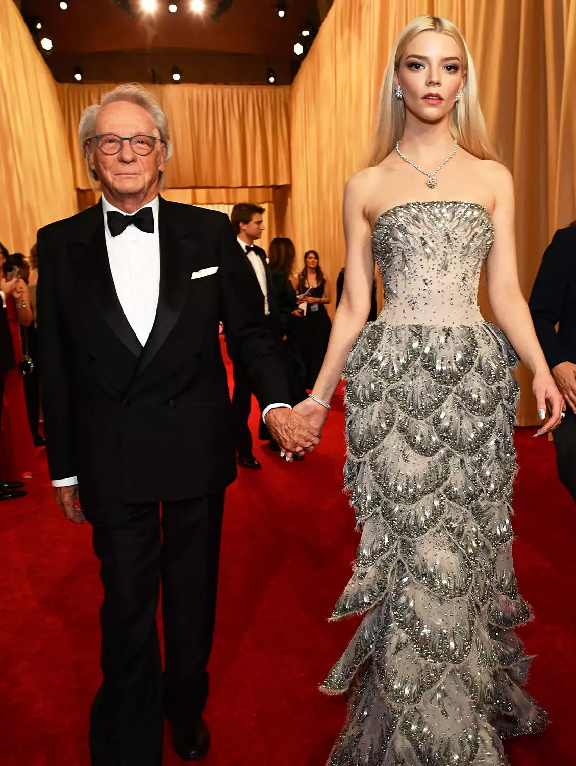 Anya Taylor-Joy arrives with her father Dennis Taylor at the 96th Annual Academy Awards at the Dolby Theatre in Hollywood, California on March 10, 2024.