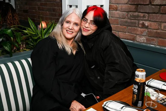 </p> <p>Michael Kovac/Getty Images for Support + Feed</p> <p> Maggie Baird and Billie Eilish in Los Angeles on Oct. 24, 2023