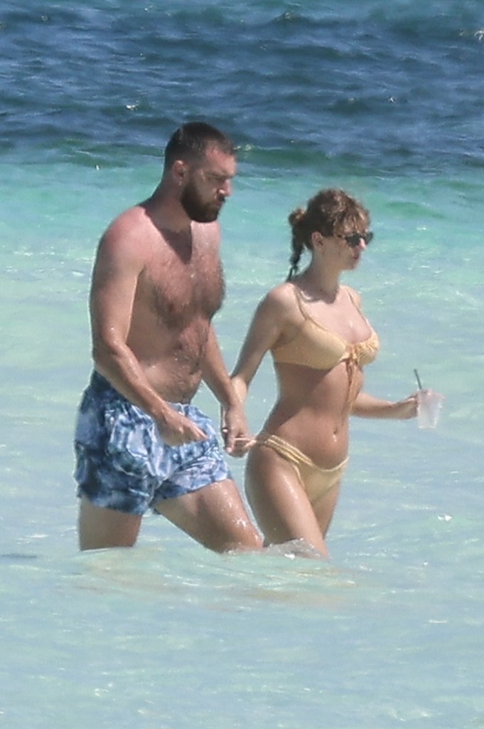 Taylor Swift, Travis Kelce share steamy kiss on PDA-filled vacation