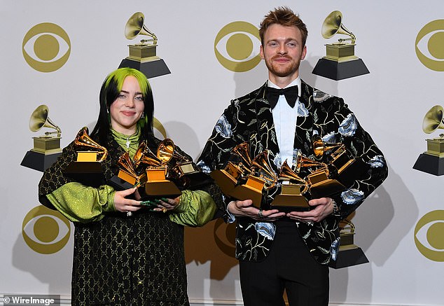 Sharing the glory: The collaborators are seen at the 62nd Annual Grammy Awards in January, where Eilish's album When We All Fall Asleep, Where Do We Go? won multiple awards