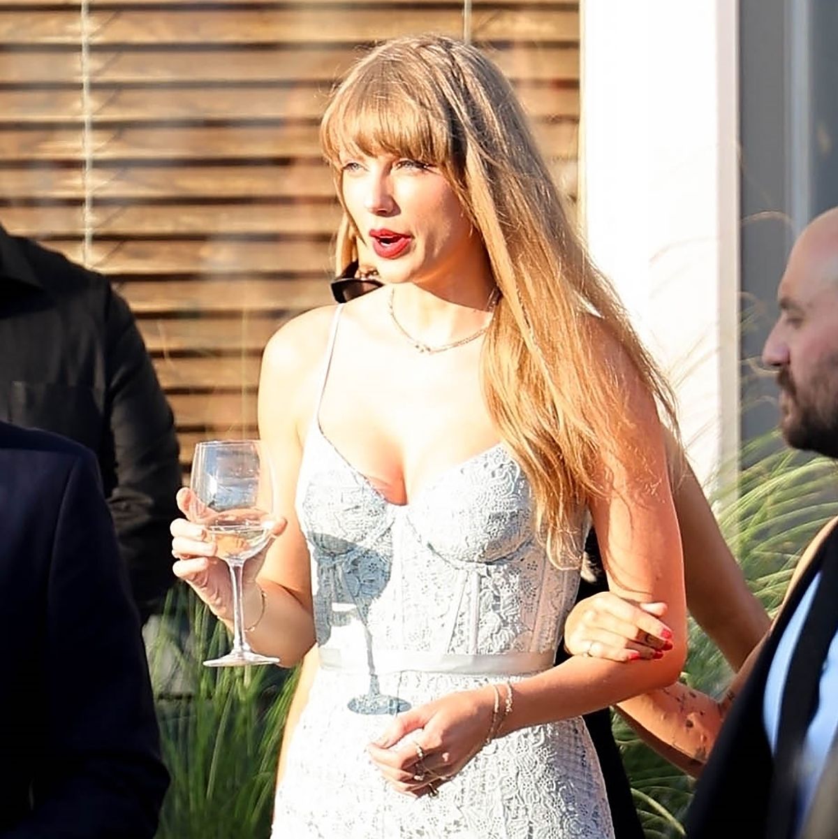 Taylor Swift Wore the Prettiest Dress Trend to a Wedding | Who What Wear