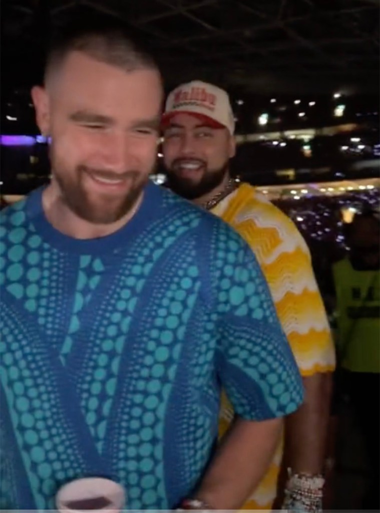 Travis Kelce hands out guitar picks to Taylor Swift fans at Eras Tour