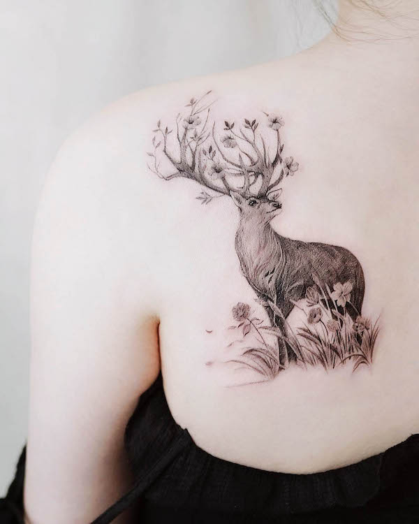 Intricate deer shoulder blade tattoo by @nandotattooer