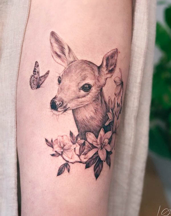 Butterfly and baby deer tattoo by @lorie_garcia_tattoo