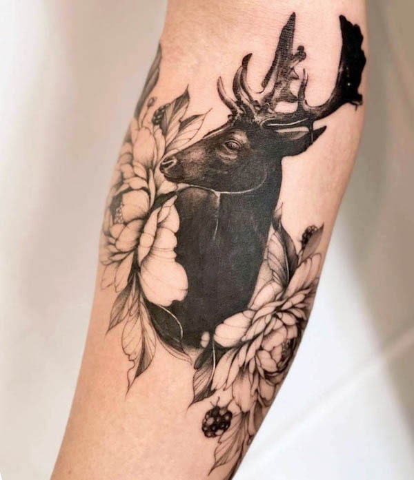 Black deer cover-up tattoo by @tattooist.bejby