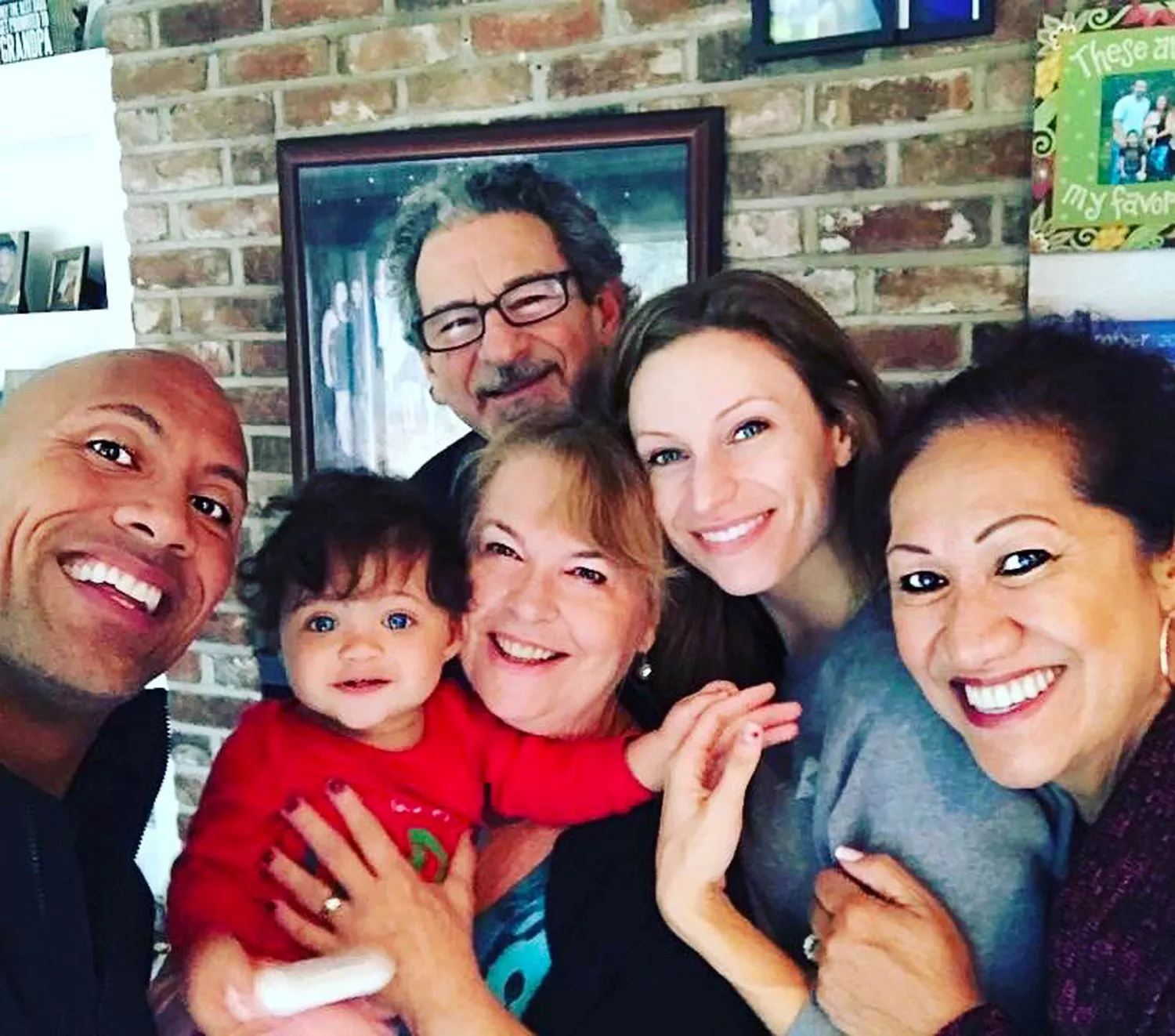 Dwayne Johnson and Lauren Hashian with their family.