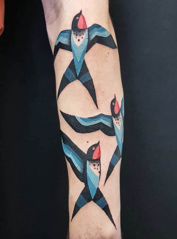 Colored swallow forearm tattoo by @bardtjelta