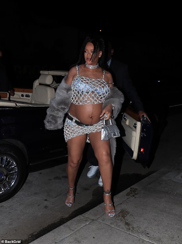 Details: Rihanna's skirt had a belt detail as well