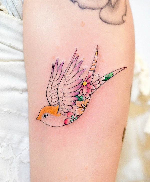 Cute swallow tattoo for women by @adelaide.tattooing