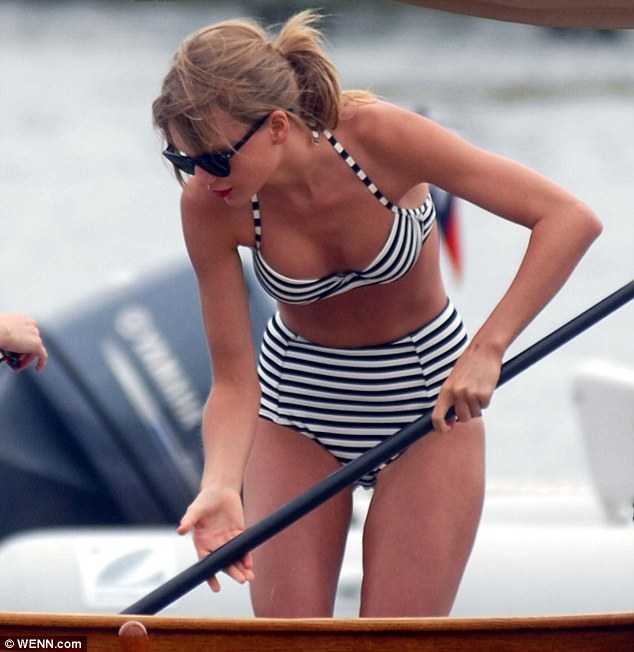 Taylor Swift dons Fifties-style striped bikini for paddle boarding with  tour mate Ed Sheeran | Daily Mail Online