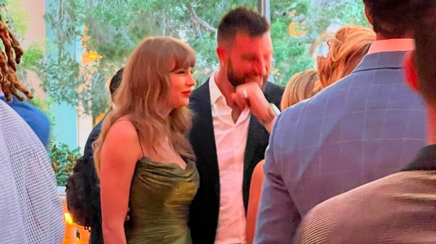 Travis Kelce can't keep his hands off Taylor Swift as they look 'out of  sync', claims expert - The Mirror US