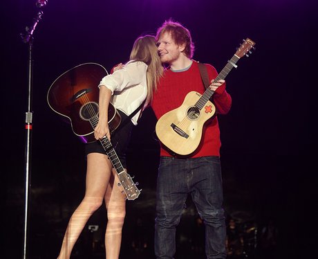 Taylor Swift embraces surprise guest Ed Sheeran ahead of the pair's  performance. -... - Capital