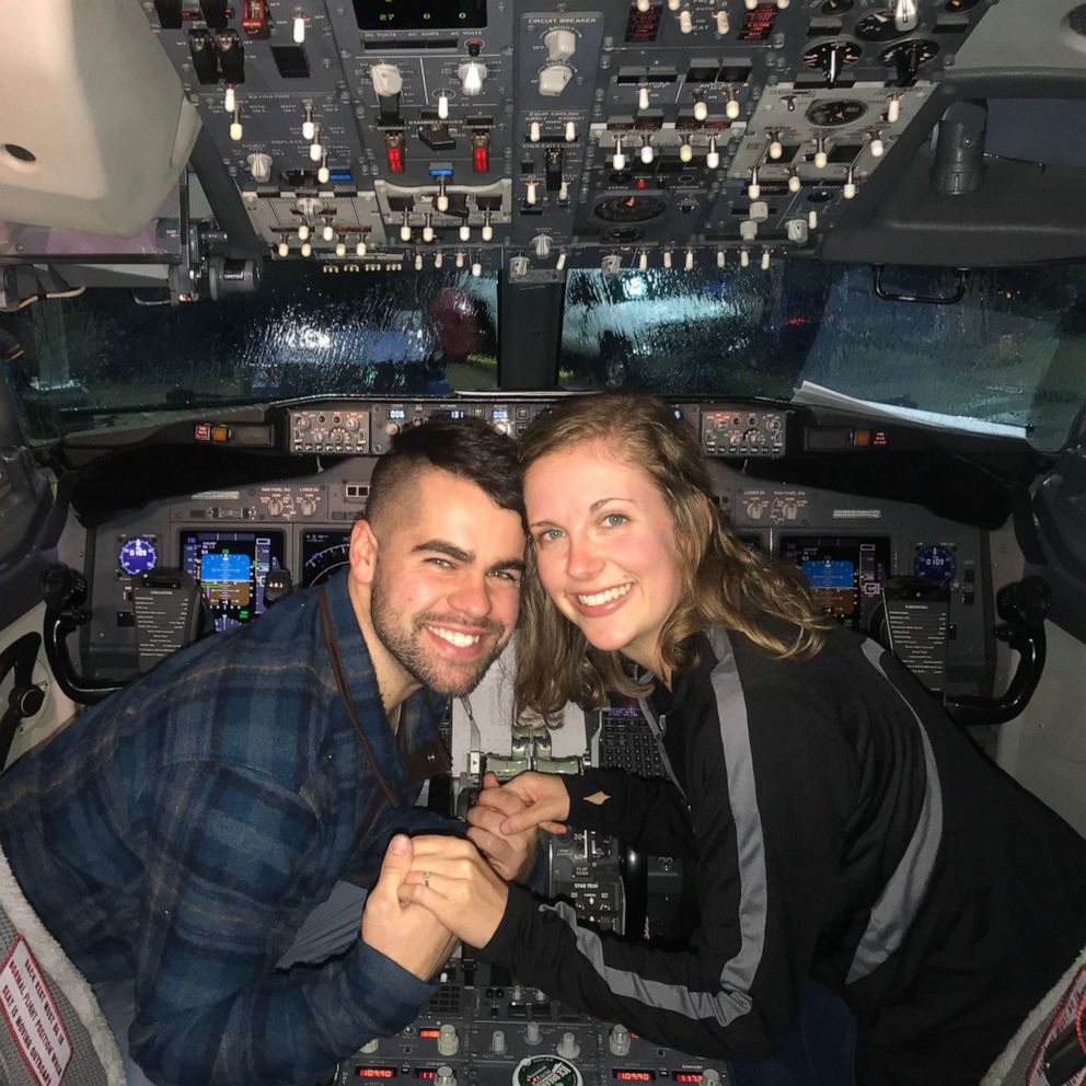 This woman was shocked when her boyfriend surprised her on flight and  proposed