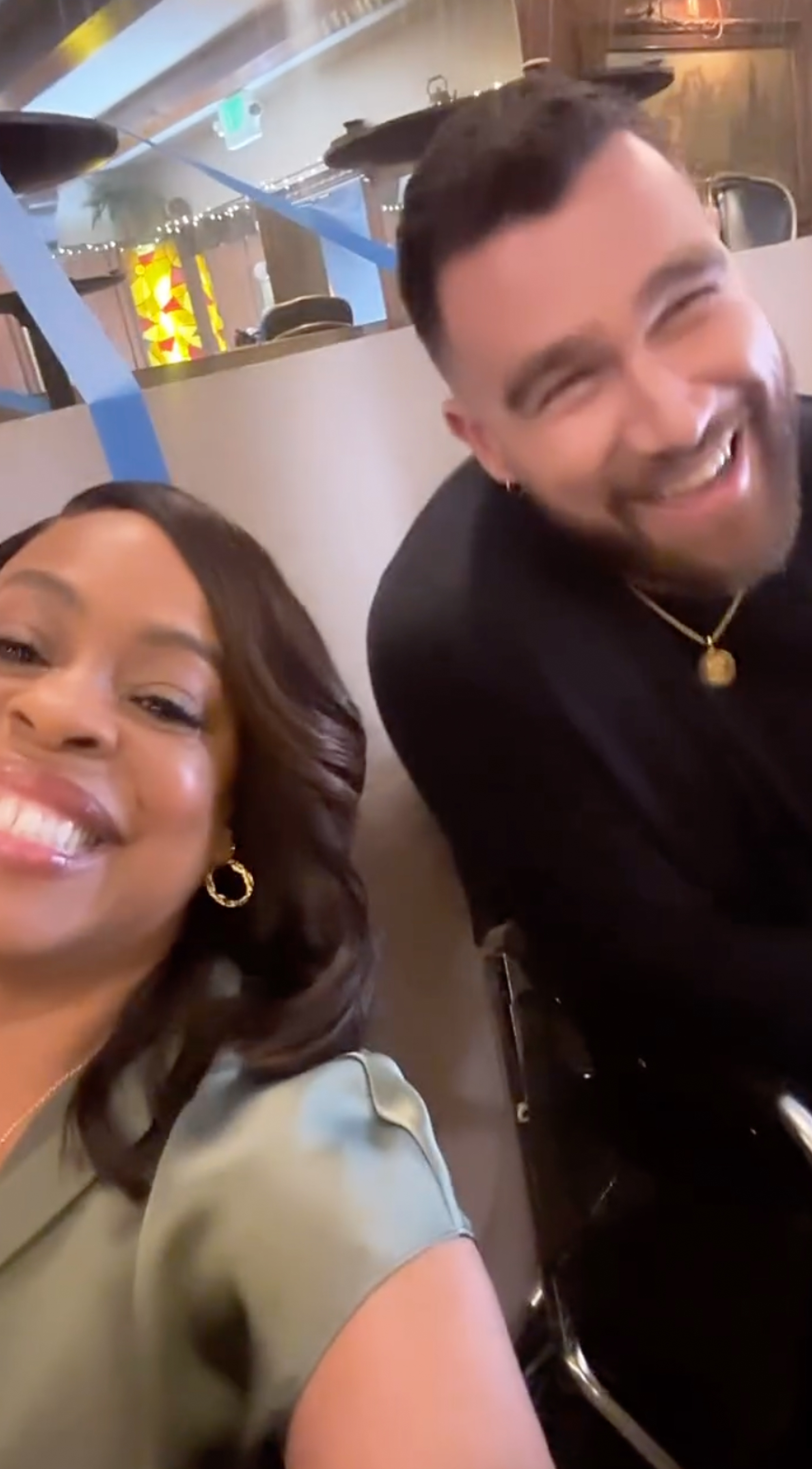 Travis Kelce and Niecy Nash.